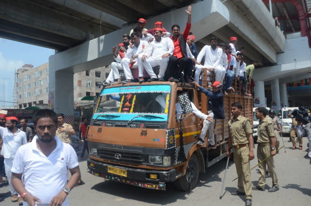 sp activist arrested after lathicharge