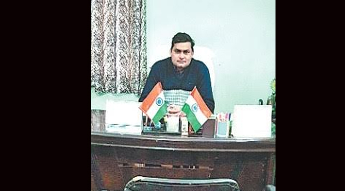 up police clerk sit on chair meerut