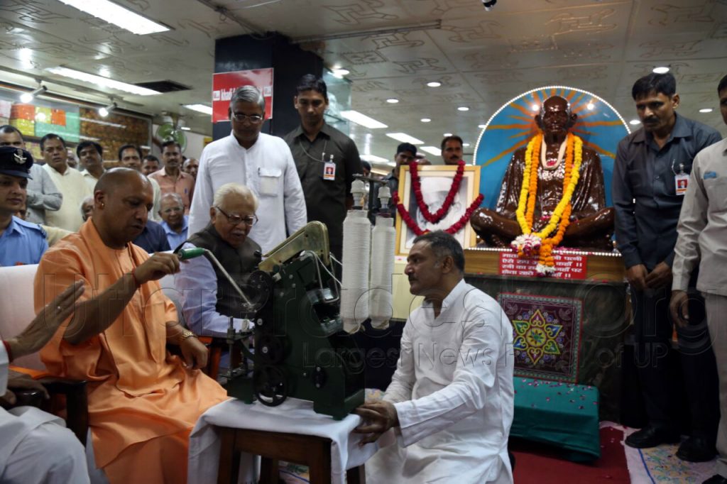 chief minister yogi adityanath spins charkha