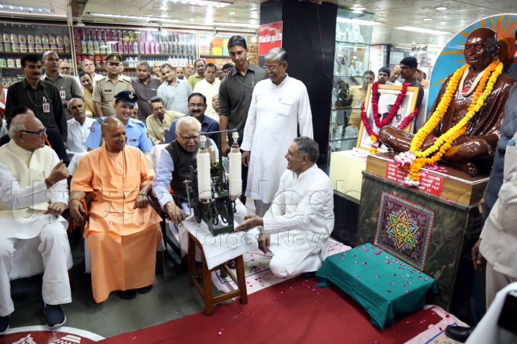chief minister yogi adityanath spins charkha
